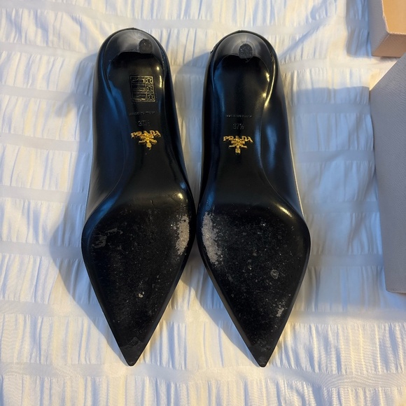 Prada Black Leather Pointed Toe Pumps with White Trim and Bow Accent - Picture 3 of 4